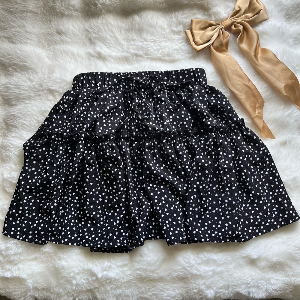Black skirt with white polka dots
